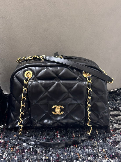 SAC BOWLING 33 EN AGNEAU SOUPLE NOIR MÉTALLERIE DORÉE
