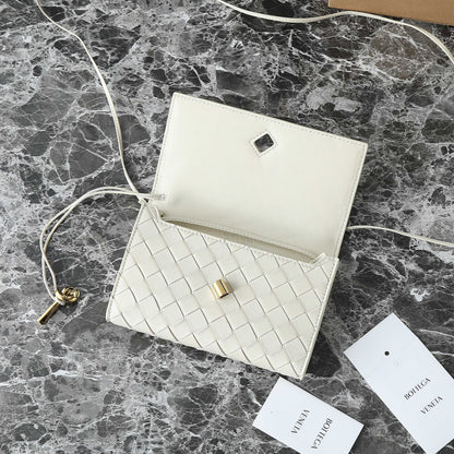 BOTTEGA VENETA 25S POCHETTE ANDIAMO 19 EN CUIR DE VEAU IVOIRE FINITIONS DORÉES
