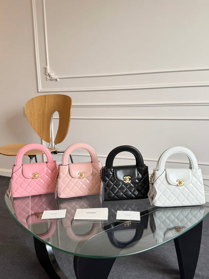 SAC CABAS KELLY 19 EN CUIR DE VEAU ROSE PÂLE AVEC ACCASTILLAGE DORÉ