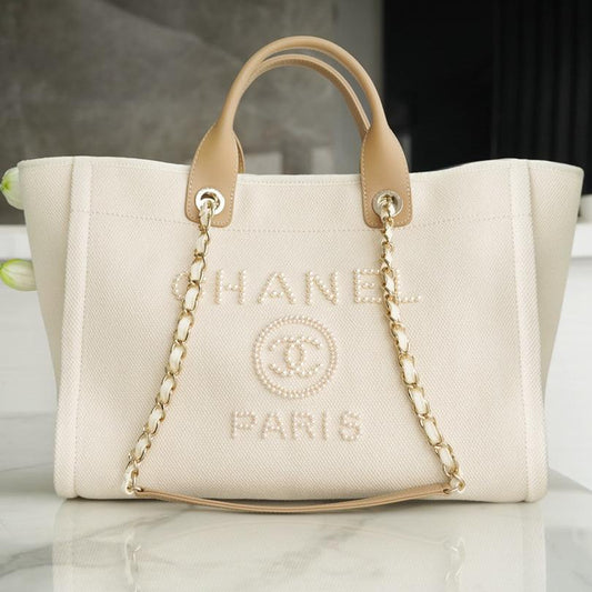 CABAS 39 LOGO PERLÉ EN TOILE BEIGE QUINCAILLERIE DORÉE