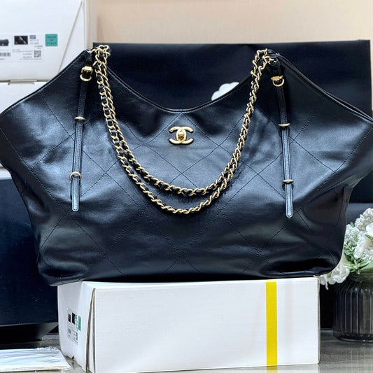 GRAND SAC SHOPPING MAXI 59 EN VEAU NOIR MÉTAL DORÉ